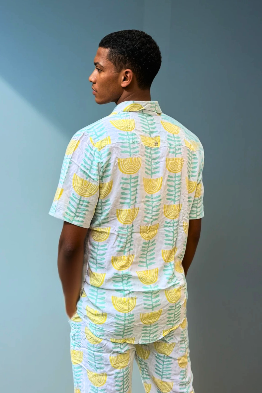 Back view of the Green & Gold Summer Sessions Shirt highlighting the all-over green and gold print and easy summer drape.