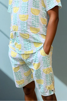 Front view of the Green & Gold Summer Sessions Shorts showing comfortable waistband, pockets and breathable summer fabric.