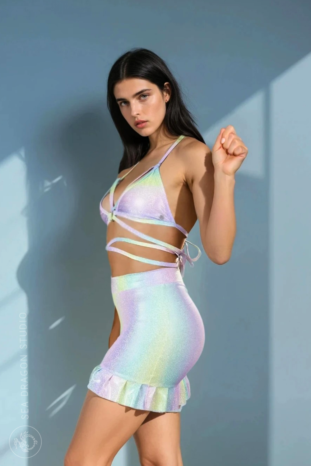 Pastel rainbow triangle top and ruffle mini skirt matching set, holographic Unicorn Dreams shimmer.